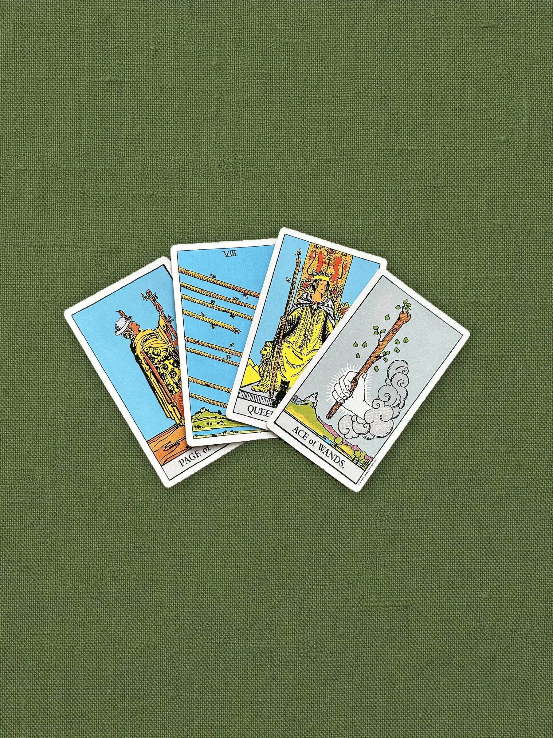 The suit of Wands on olive linen
