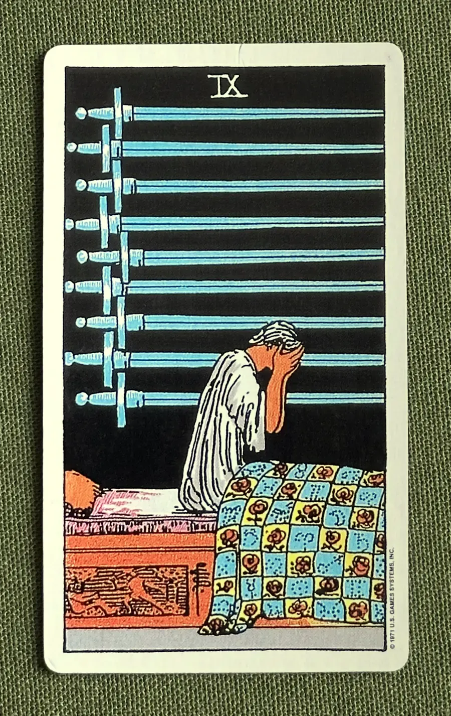 Nine of Quills — Nine of Swords from the Rider–Waite deck