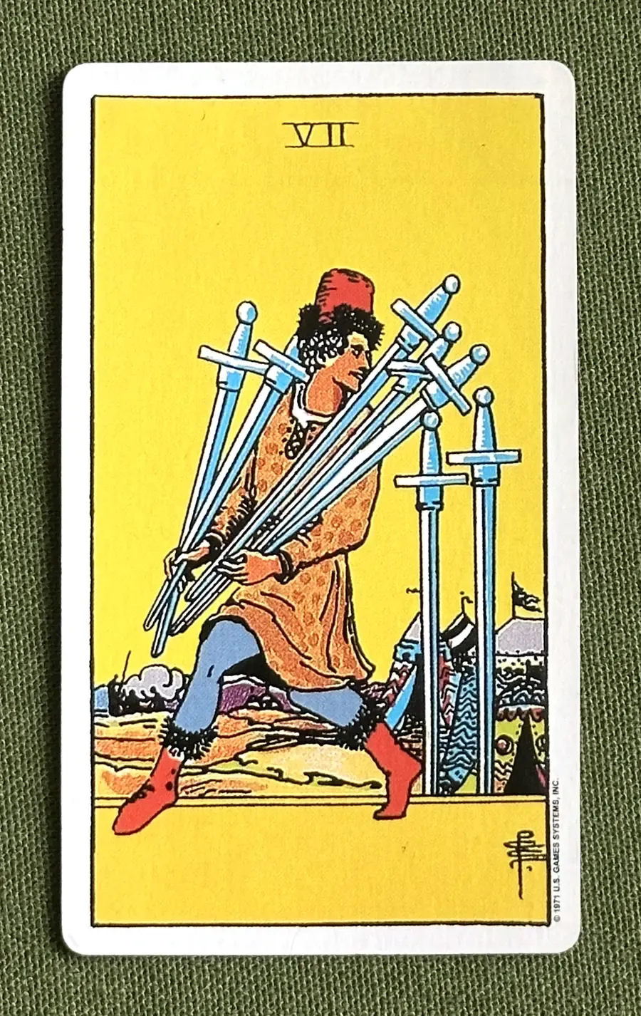 Seven of Quills — Seven of Swords from the Rider–Waite deck