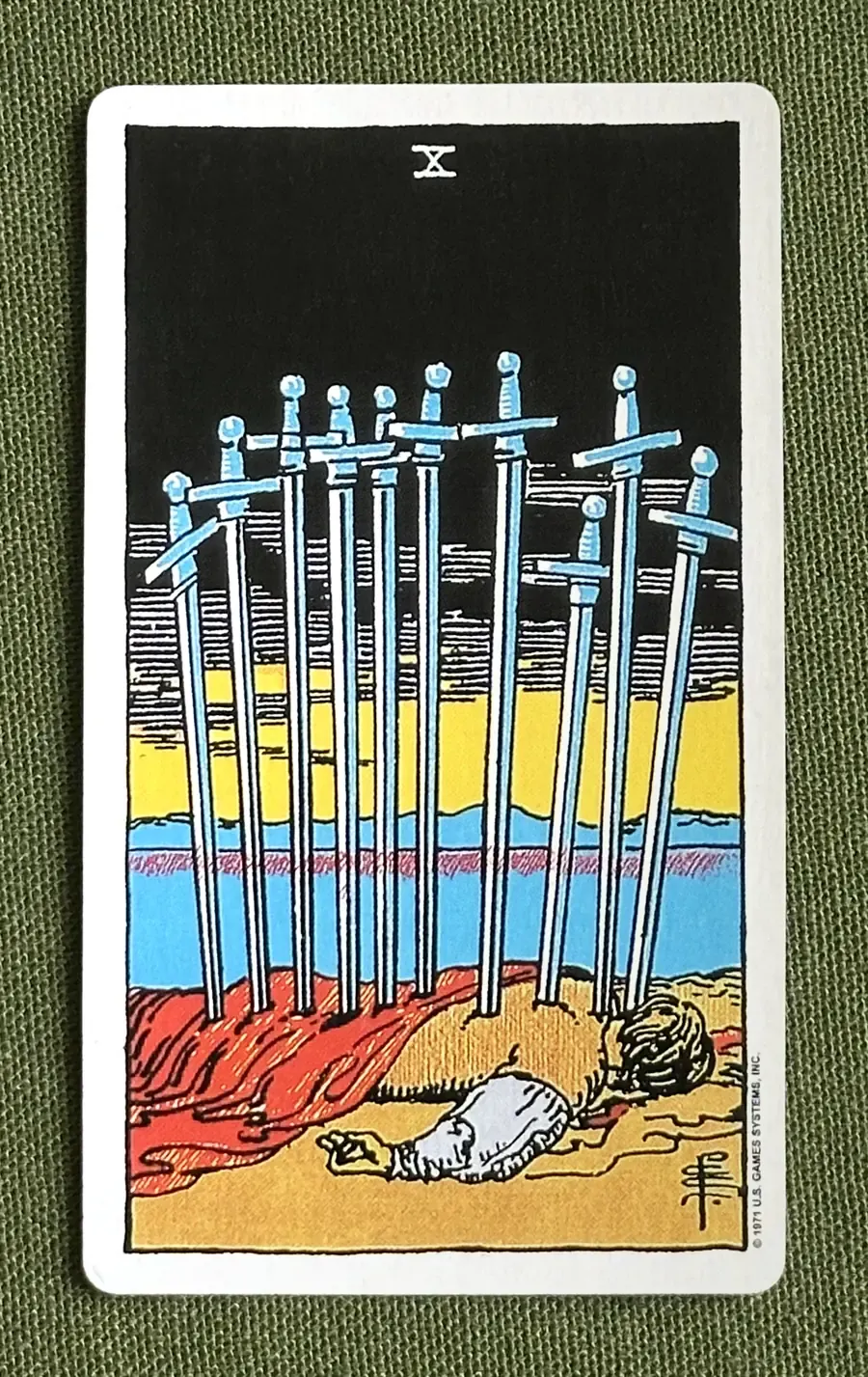 Ten of Quills — Ten of Swords from the Rider–Waite deck